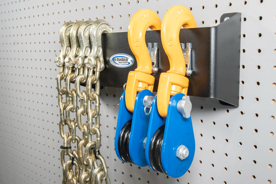 Chains and Pulleys Mounted Onto Pegboard
