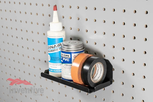 garage adhesives stored on pegboard