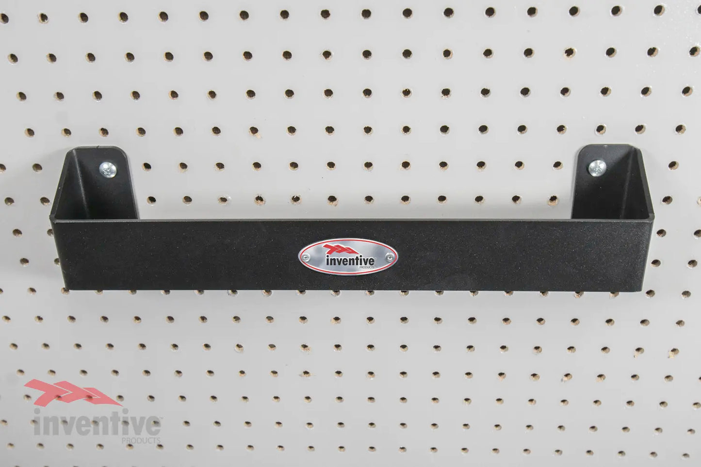Large Metal Ratchet Strap Hanger on Pegboard Wall