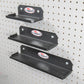 multiple sizes of pegboard wall shelves
