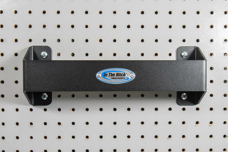 Load image into Gallery viewer, Pegboard Mounted Ratchet Strap Hanger
