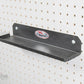 Shelf on pegboard wall