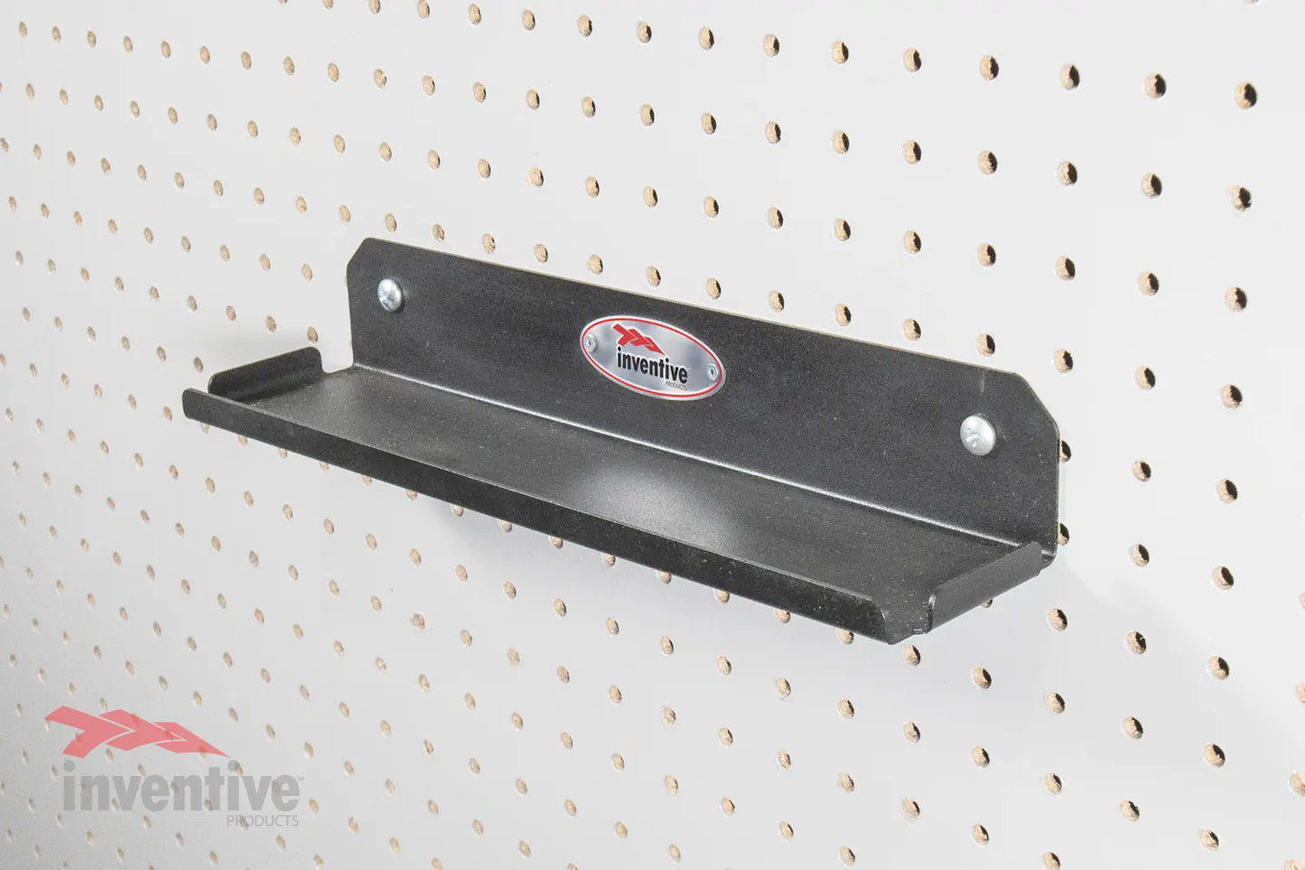 Shelf on pegboard wall