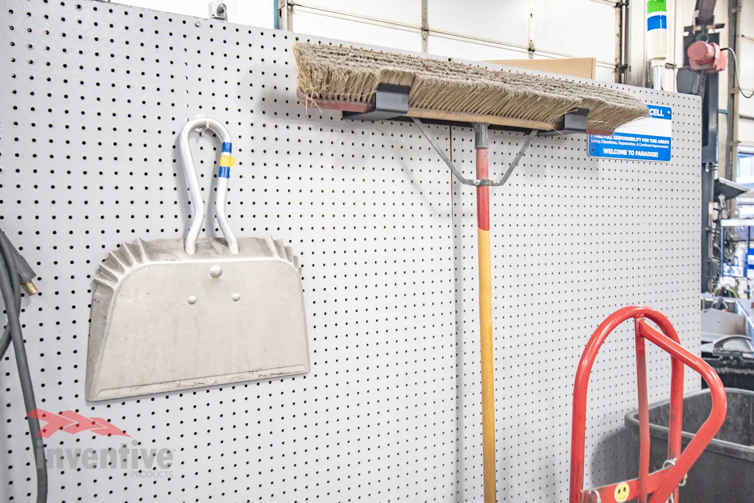 broom organization shop storage