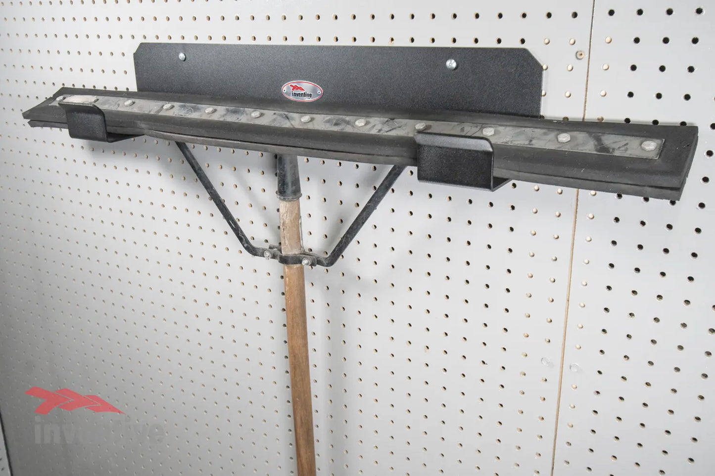garage broom holder pegboard