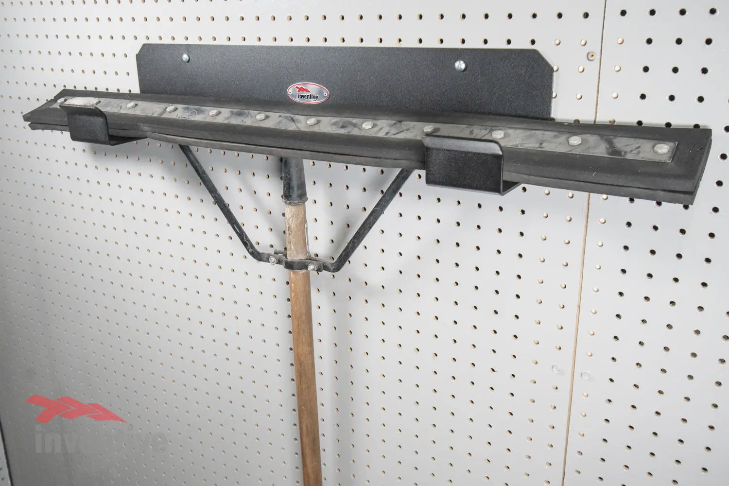 garage broom holder pegboard