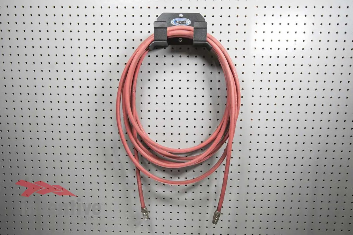 garage pegboard hose storage