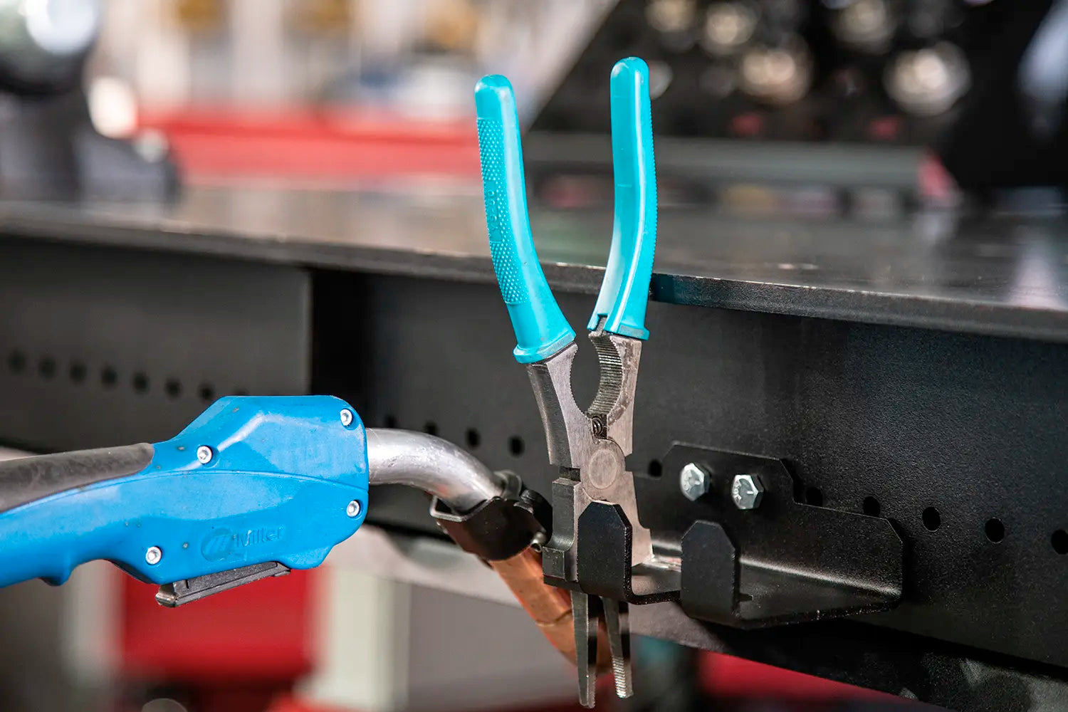 multiple holes fits torches and pliers