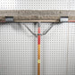 pegboard wall holder for push brooms