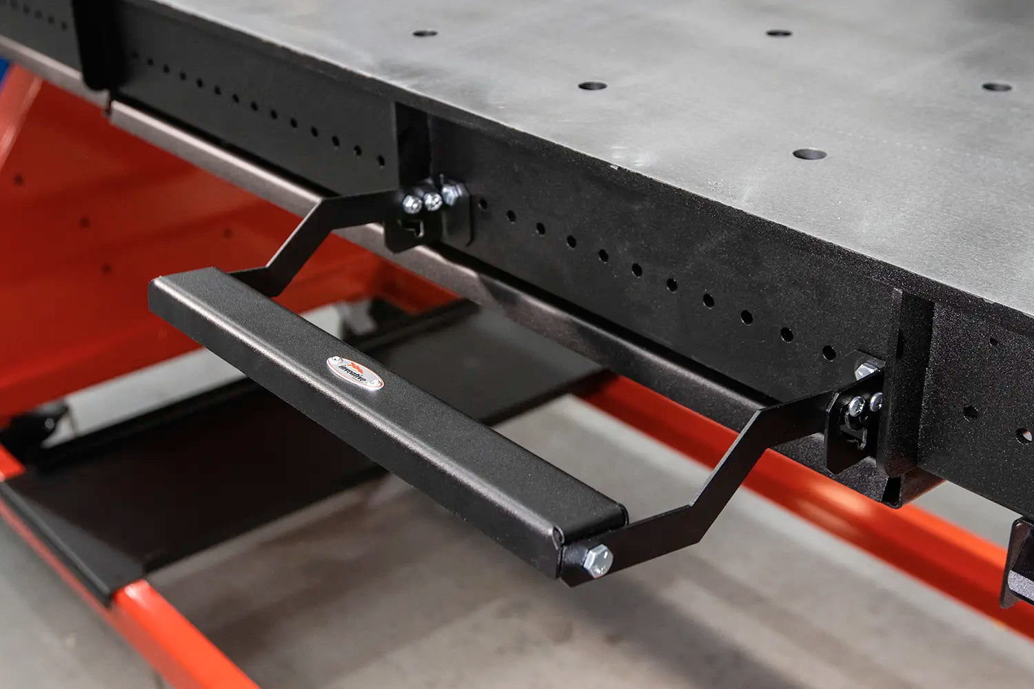 clamp holder pivots upward