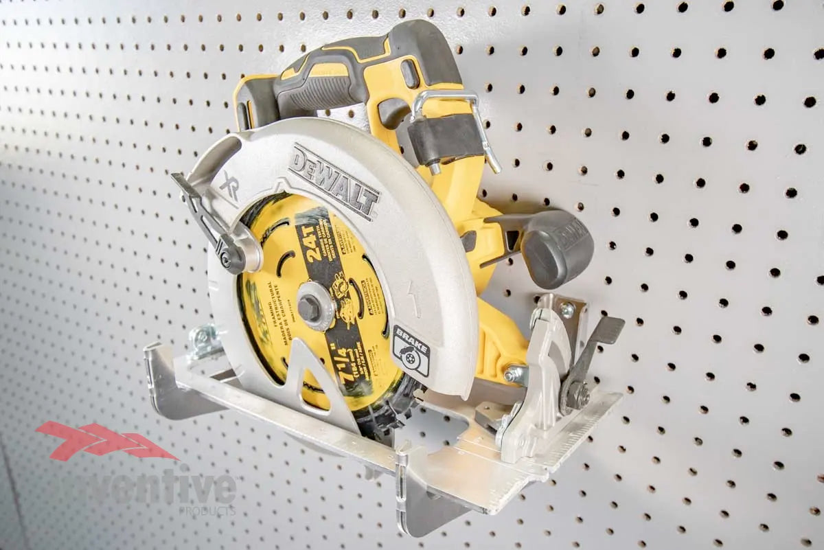 power tool hung on pegboard wall