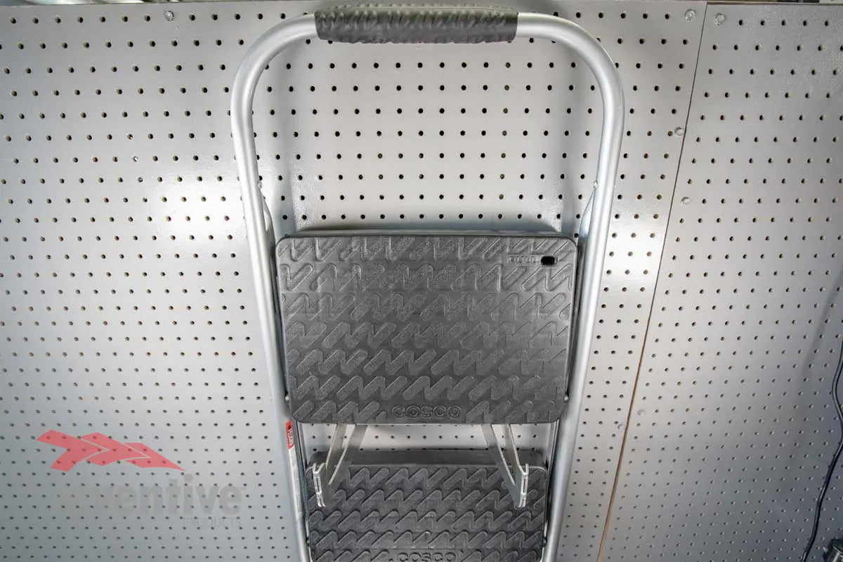 step ladder hung on wall