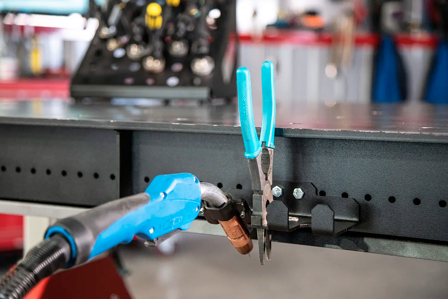 tableside tool mount to secure pliers and torches