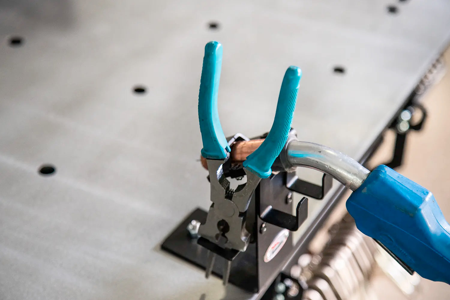 welding gun and torch mounted together