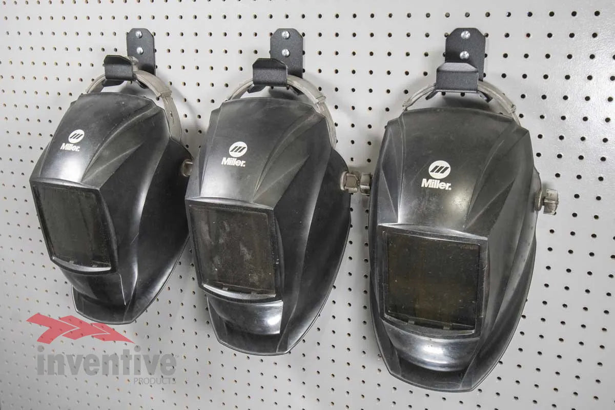 welding helmets pegboard wall storage